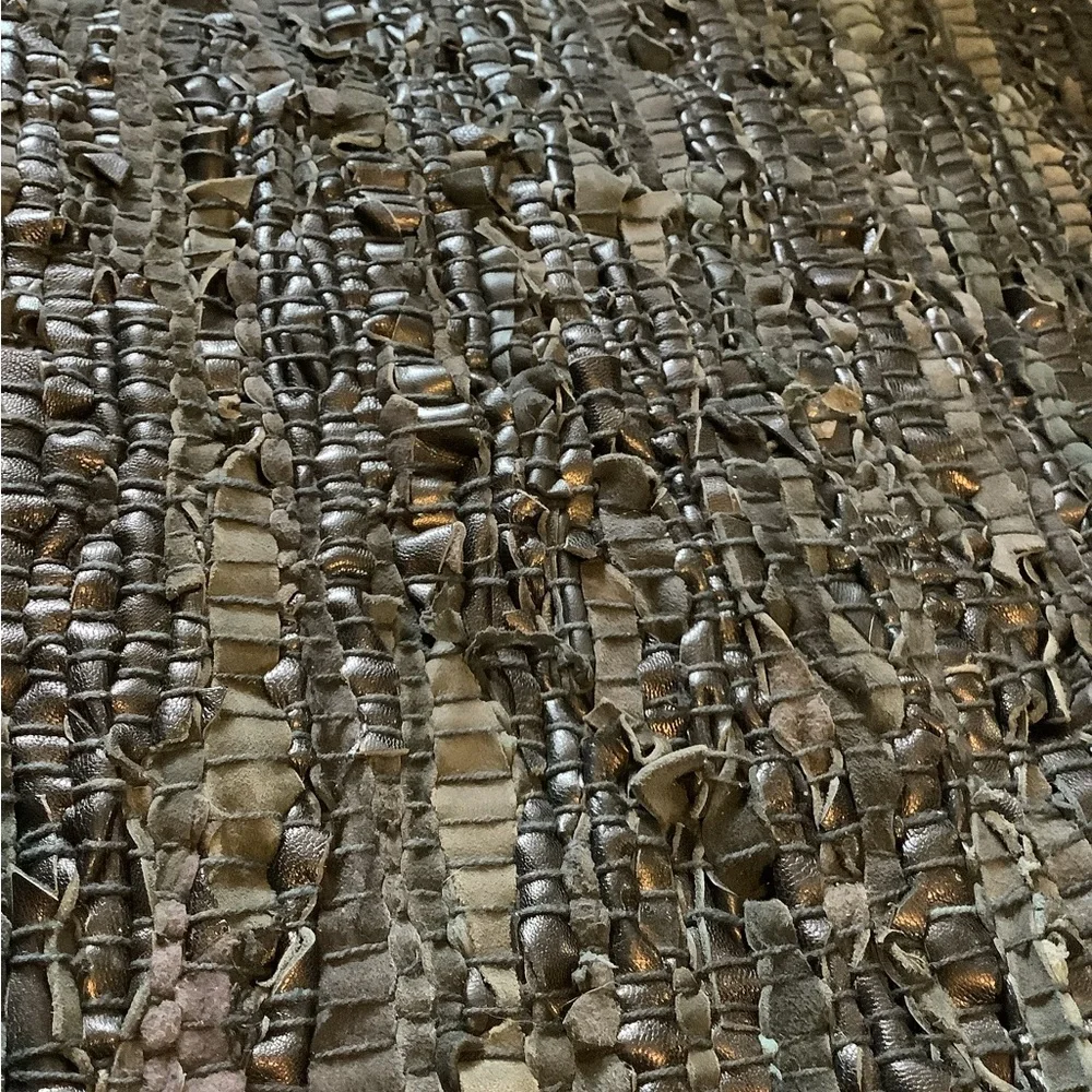 Leather scraps rug 20” by 37 1/2”